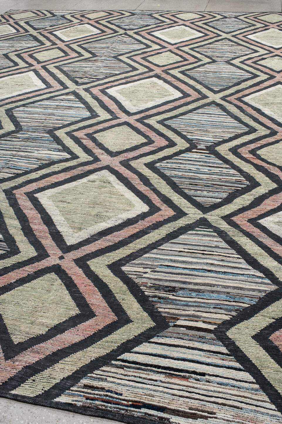 13' x 16' one-of-a-kind handmade vintage Tulu oversize rug. Color palette: black, blue, charcoal, dark gray, dim gray