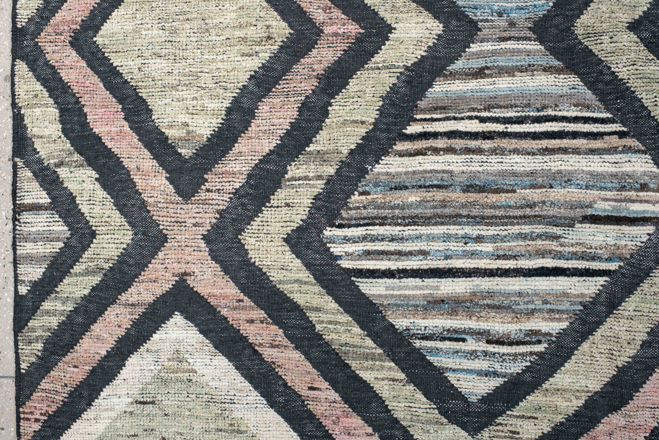 13' x 16' one-of-a-kind handmade vintage Tulu oversize rug. Color palette: ivory, charcoal, blush, pale blue, sage, taupe