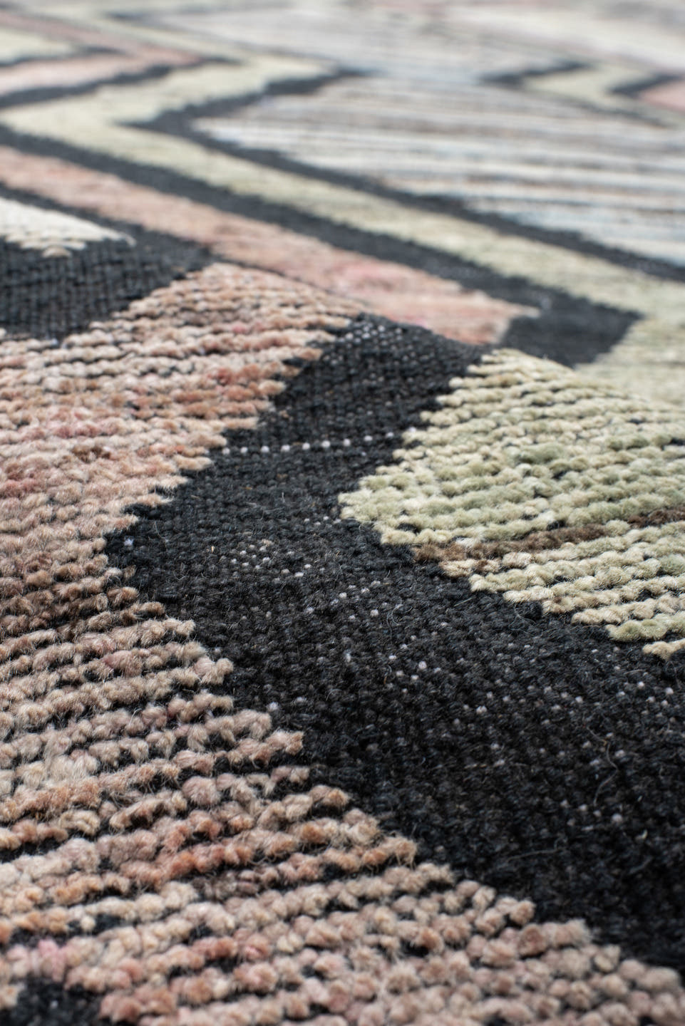 13' x 16' one-of-a-kind handmade vintage Tulu oversize rug. Color palette: ivory, charcoal, blush, pale blue, sage, taupe