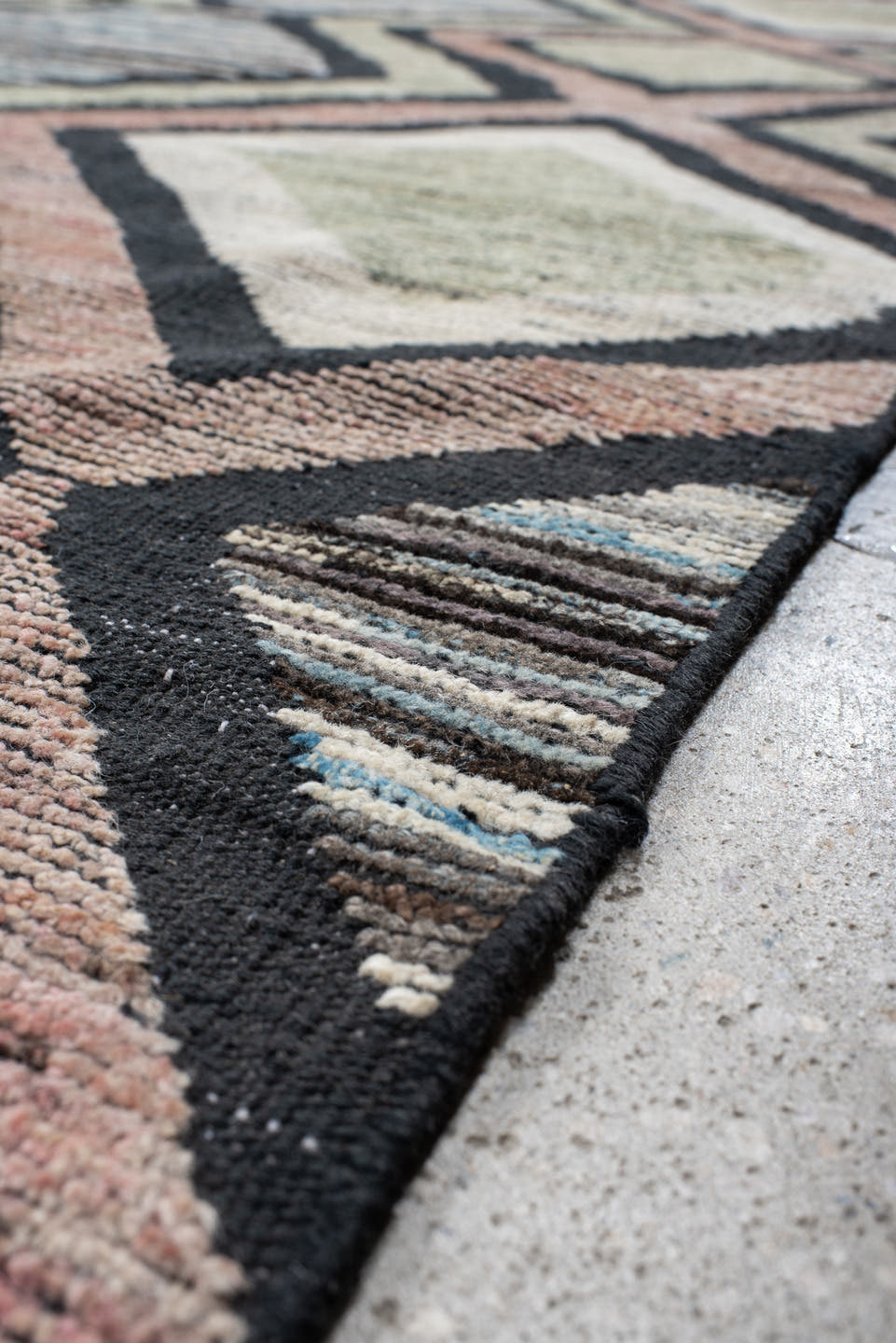 13' x 16' one-of-a-kind handmade vintage Tulu oversize rug. Color palette: ivory, charcoal, blush, pale blue, sage, taupe