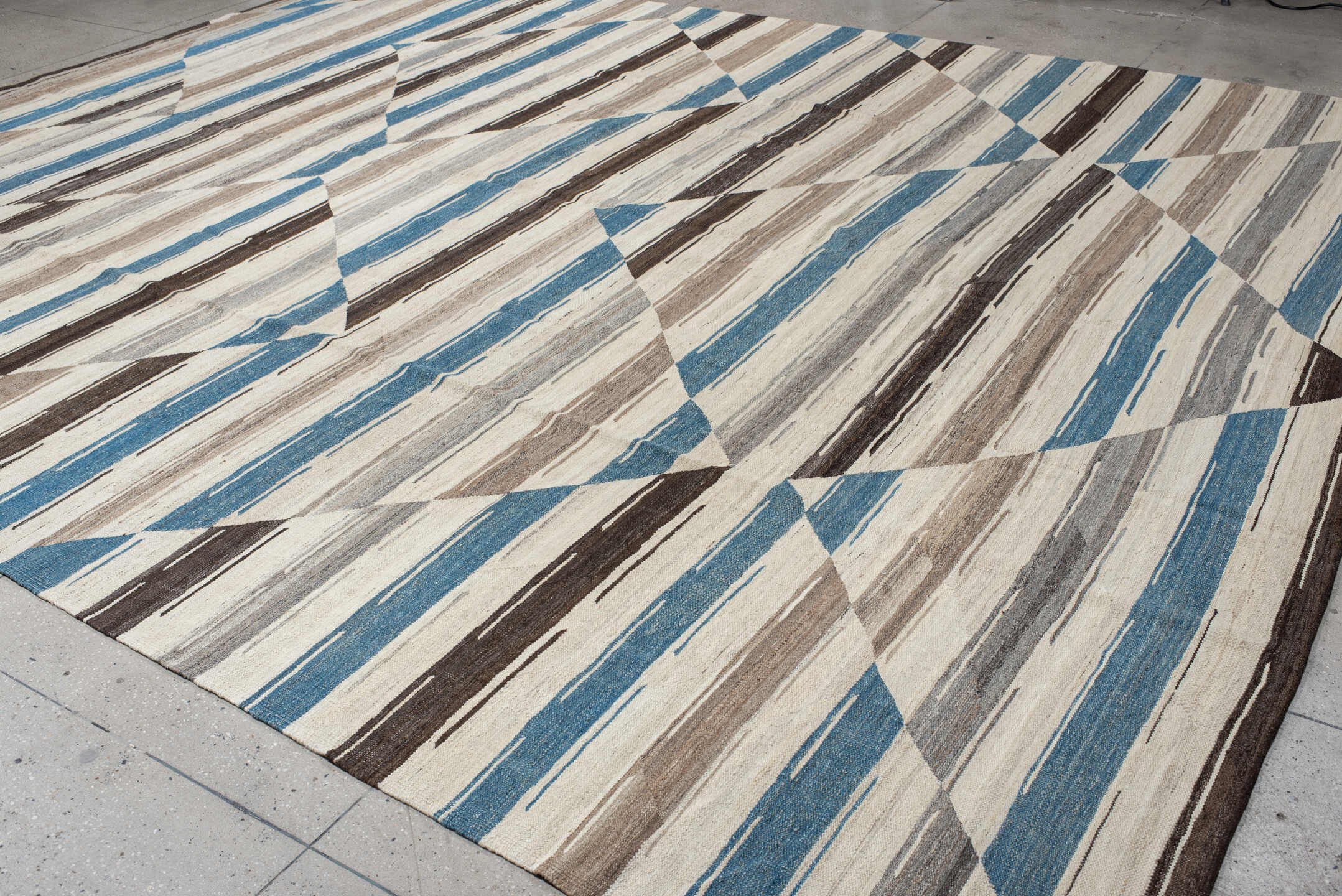13' x 15' one-of-a-kind handmade vintage Kilim oversize rug. Color palette: ivory, taupe, turquoise, brown, gray, beige