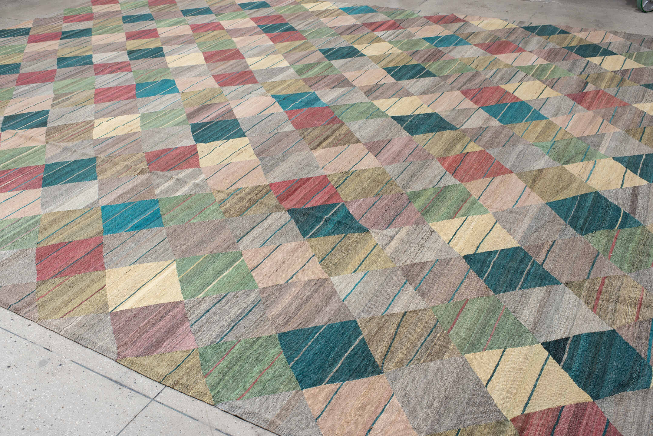 13' x 17' one-of-a-kind handmade vintage Kilim oversize rug. Color palette: taupe, teal, sage, rose, ivory, gold, gray