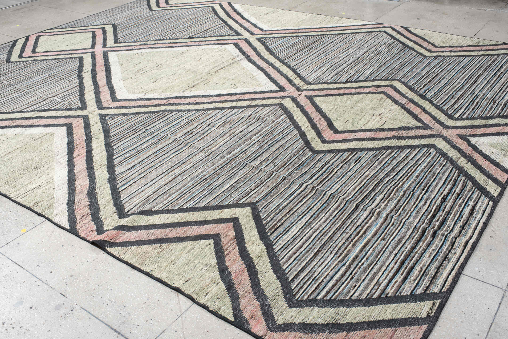 12' x 15' one-of-a-kind handmade vintage Tulu oversize rug. Color palette: sage, charcoal, ivory, blush, slate, green, gray