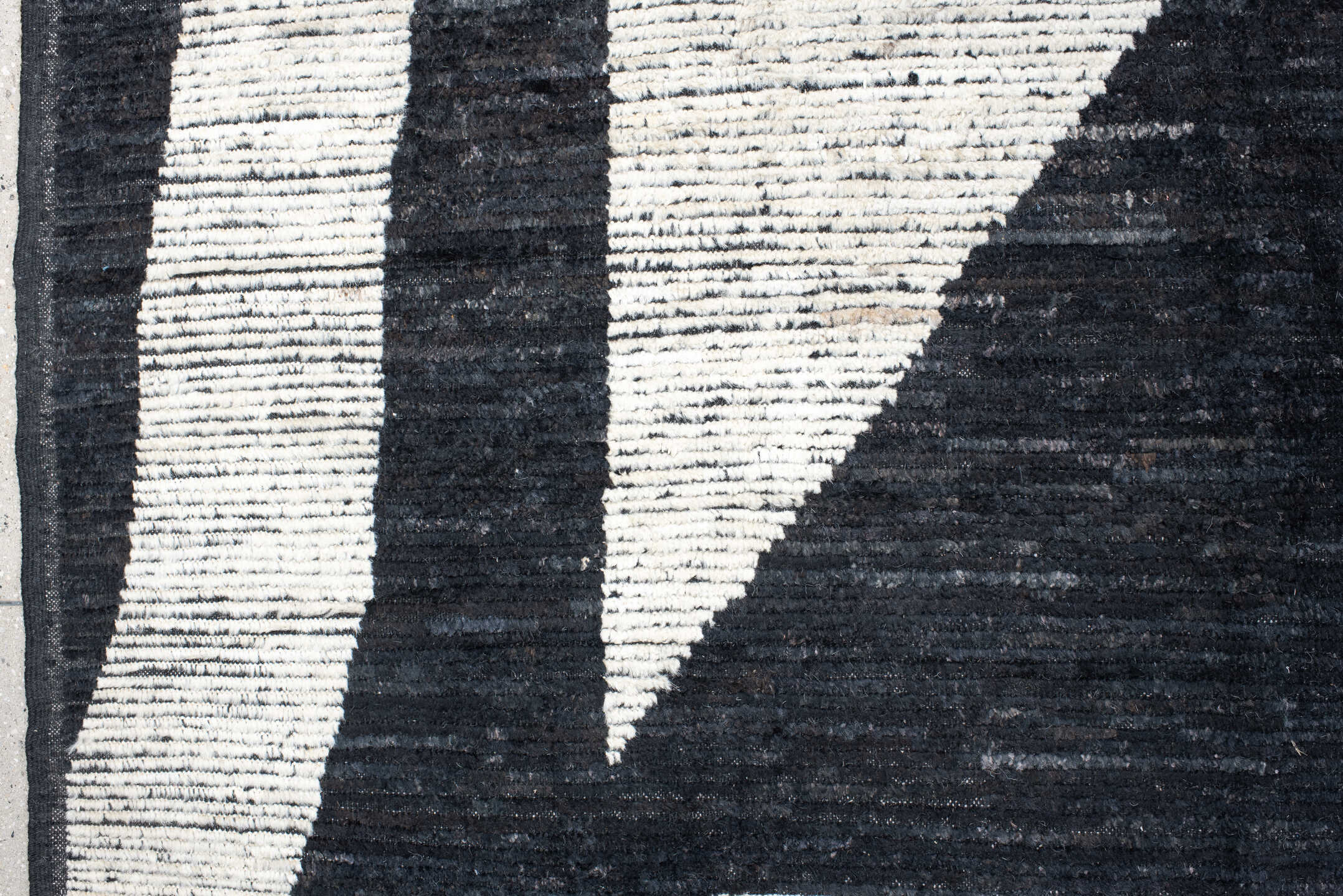 14' x 20' one-of-a-kind handmade vintage Tulu oversize rug. Color palette: ivory, charcoal, black, gray