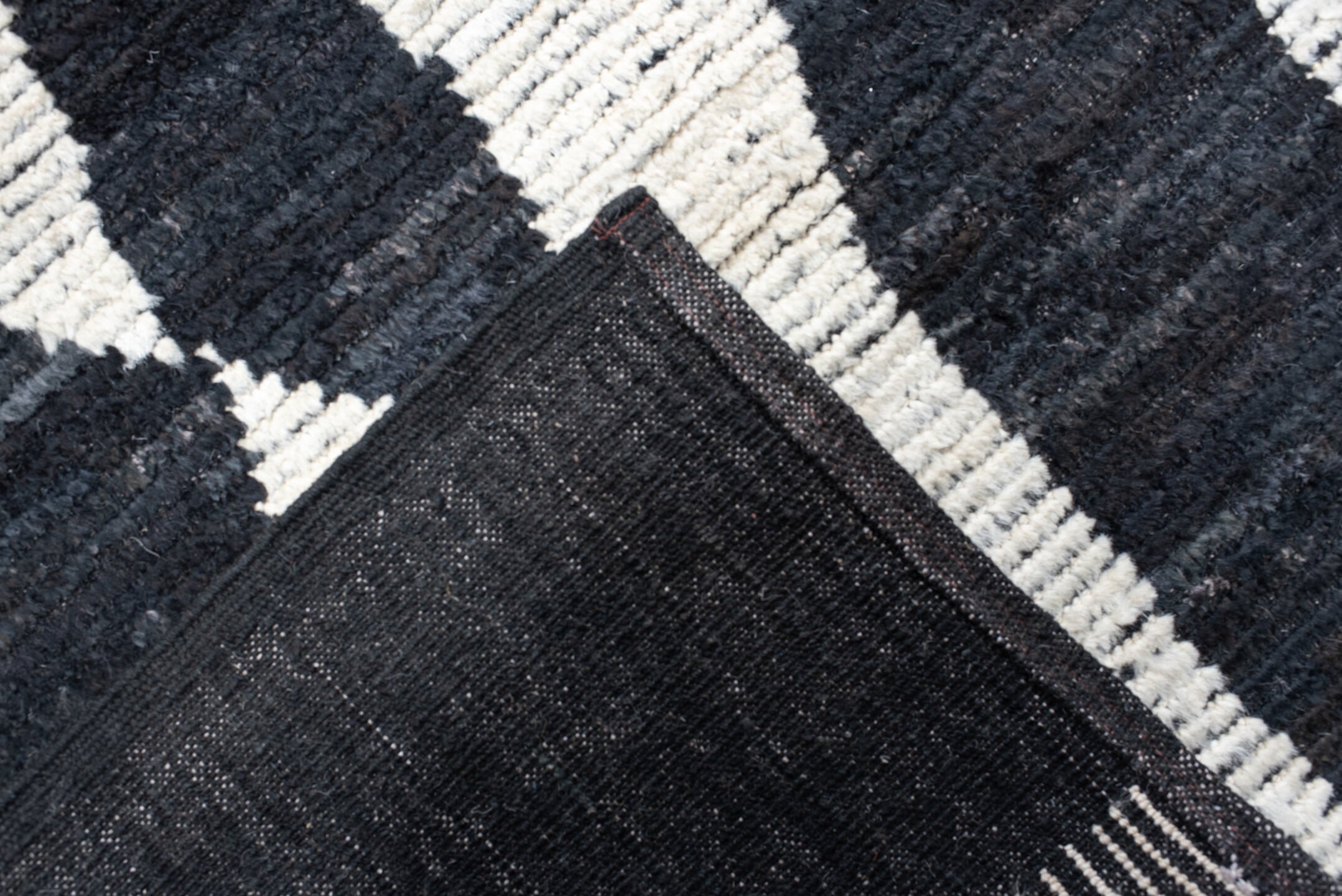 14' x 20' one-of-a-kind handmade vintage Tulu oversize rug. Color palette: ivory, charcoal, black, gray