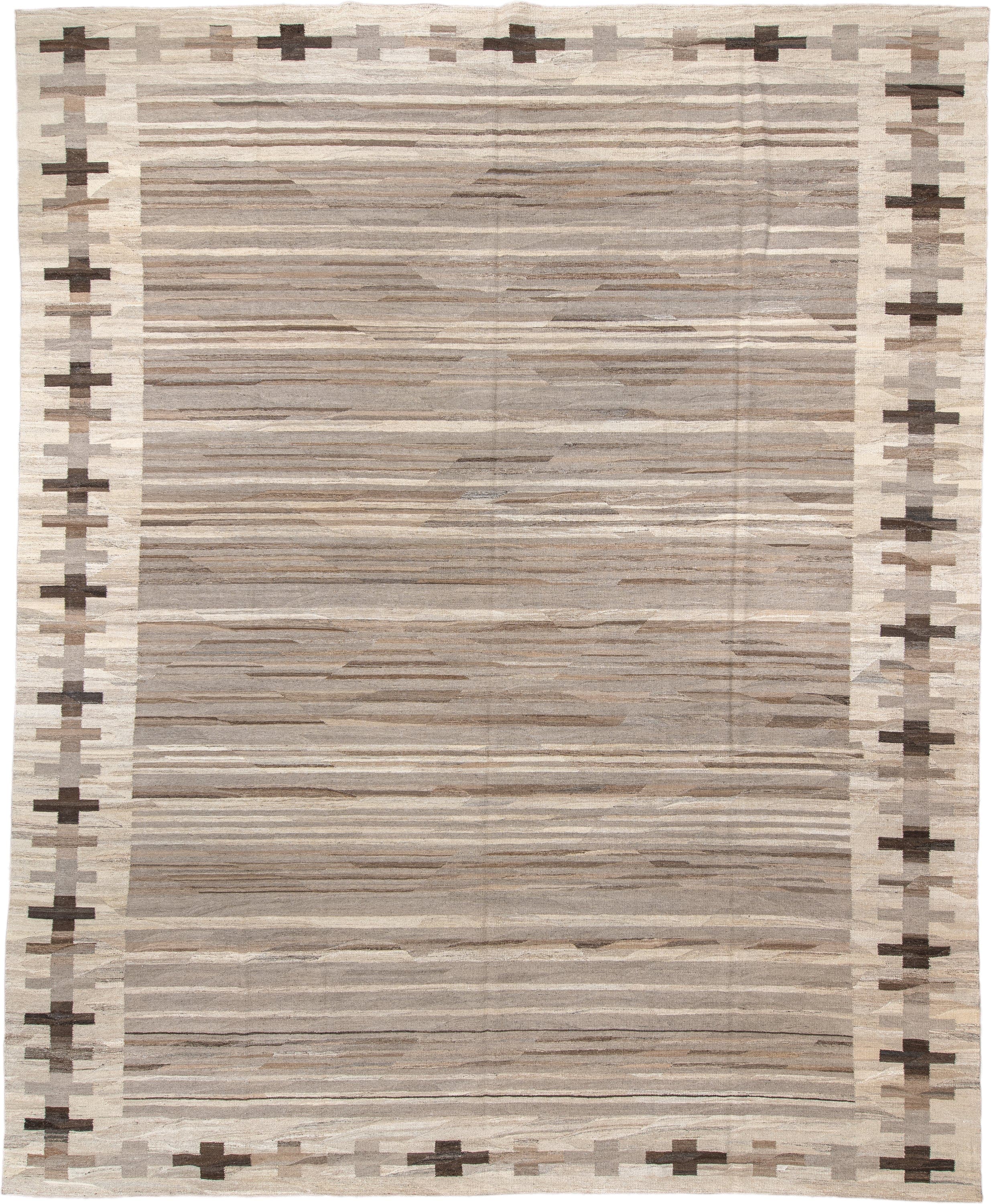 13' x 16' one-of-a-kind handmade vintage Kilim oversize rug. Color palette: taupe, ivory, cream, brown, beige, charcoal