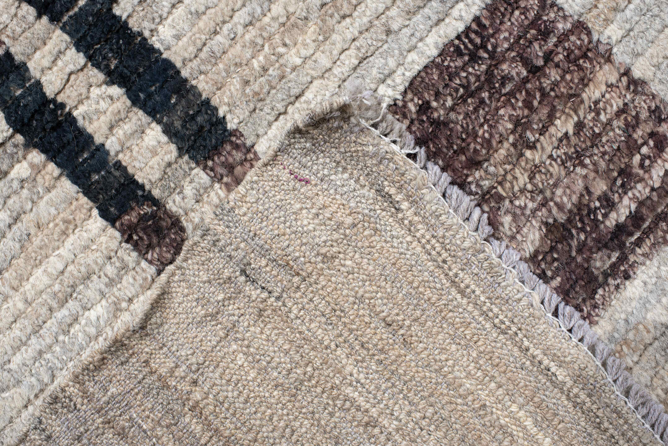 11' x 12' one-of-a-kind handmade vintage Tulu oversize rug. Color palette: ivory, charcoal, taupe, brown, gray, black, beige