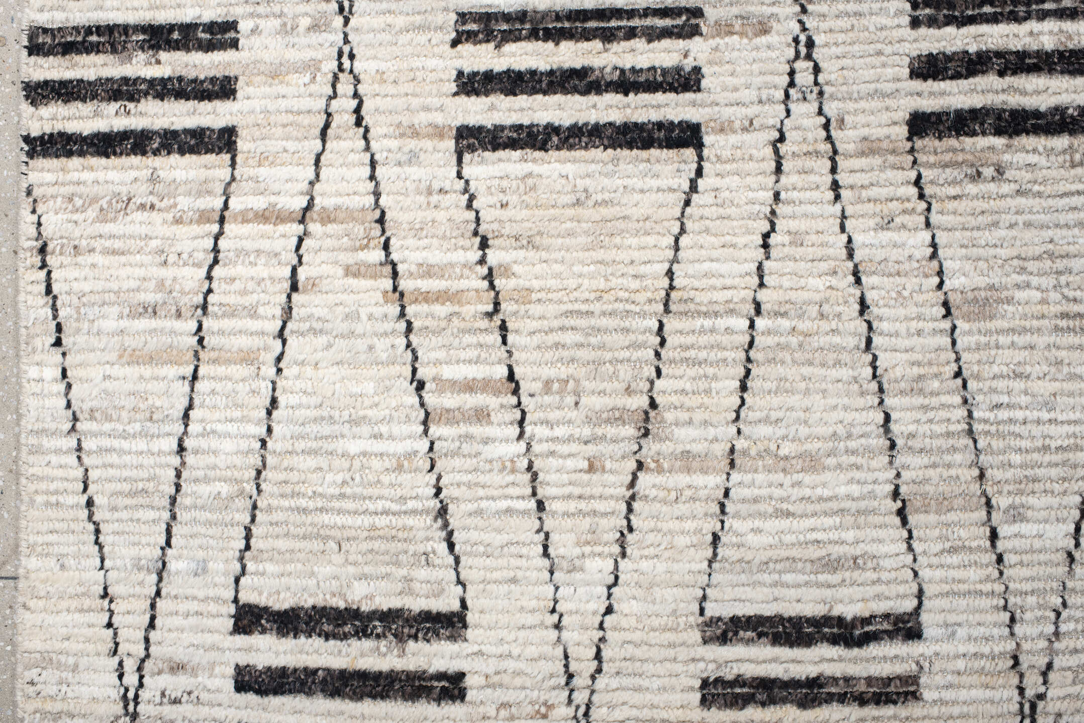 12' x 17' one-of-a-kind handmade vintage Tulu oversize rug. Color palette: ivory, charcoal, taupe, gray, black, beige