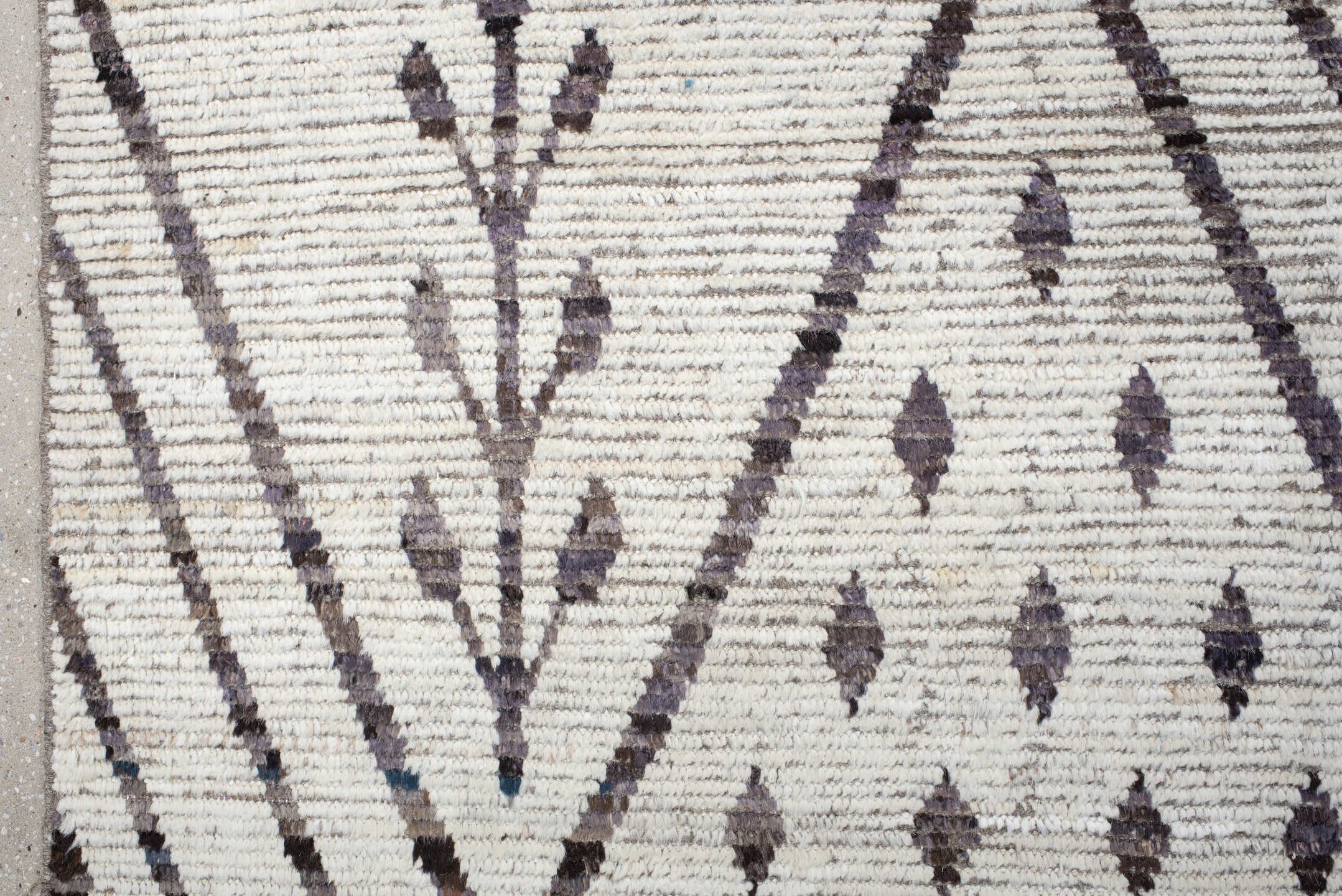 12' x 15' one-of-a-kind handmade vintage Tulu oversize rug. Color palette: ivory, charcoal, taupe, brown, gray, black, beige