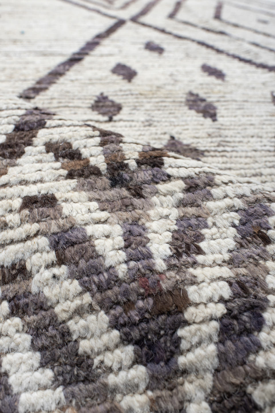 12' x 15' one-of-a-kind handmade vintage Tulu oversize rug. Color palette: ivory, charcoal, taupe, brown, gray, black, beige