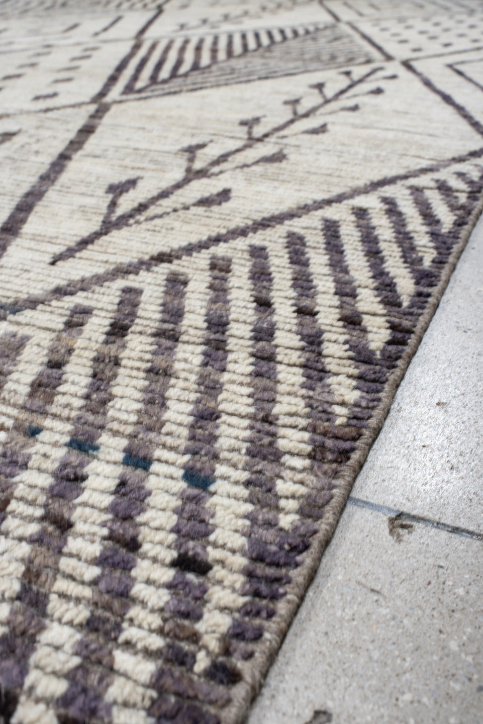 12' x 15' one-of-a-kind handmade vintage Tulu oversize rug. Color palette: ivory, charcoal, taupe, brown, gray, black, beige