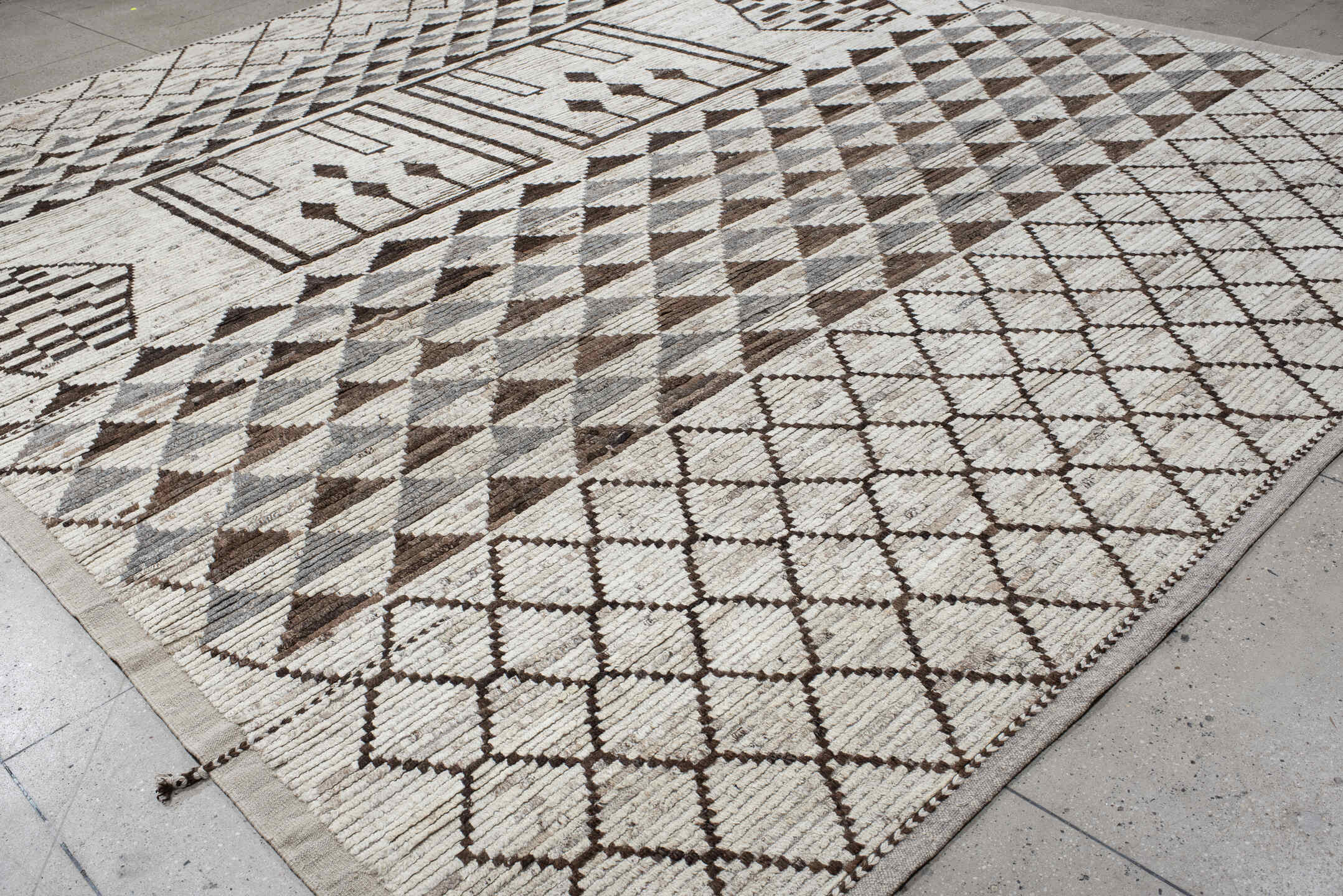 12' x 15' one-of-a-kind handmade vintage Tulu oversize rug. Color palette: ivory, brown, gray, taupe, beige
