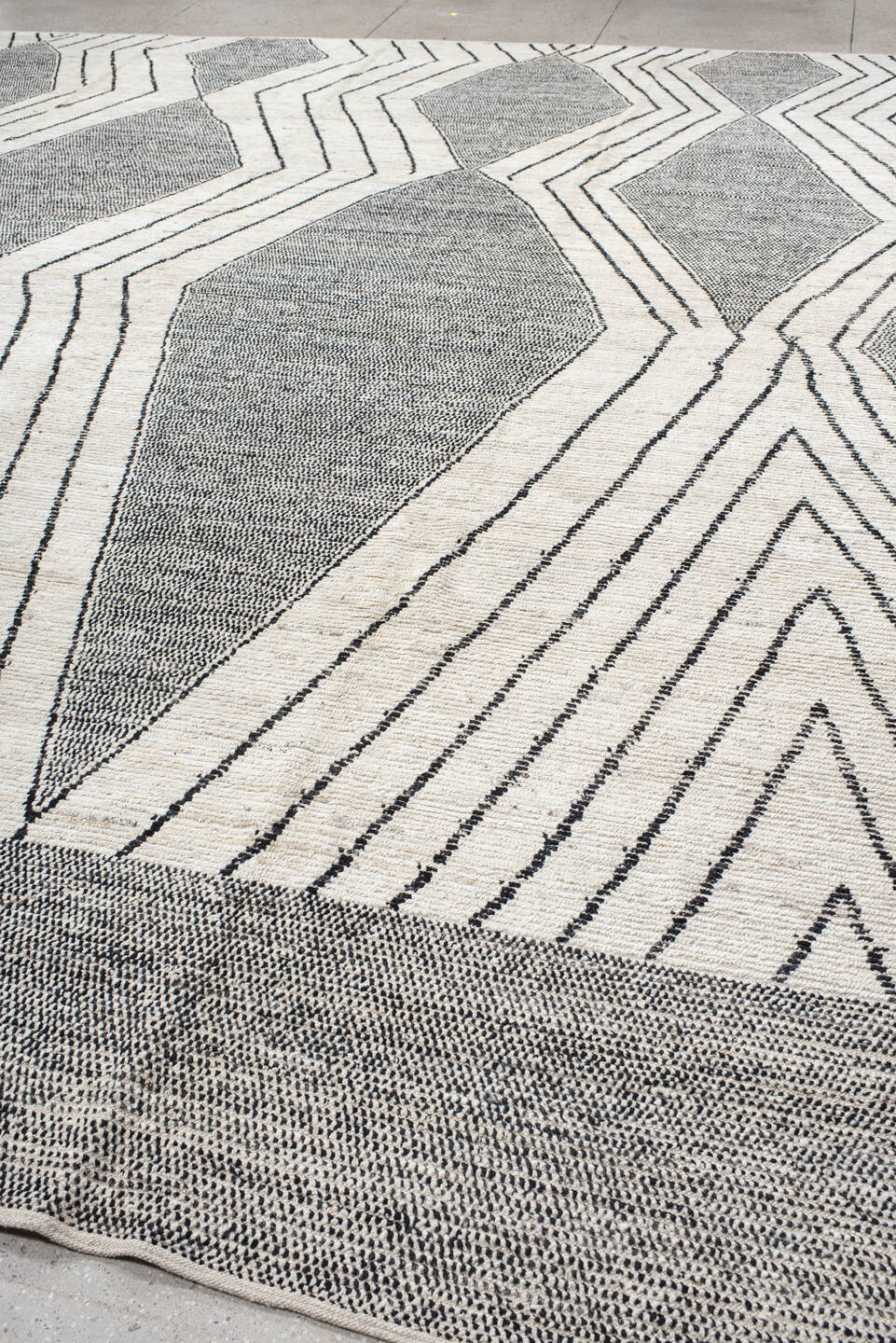 13' x 15' one-of-a-kind handmade vintage Tulu oversize rug. Color palette: black, blue, charcoal, dark gray, dim gray