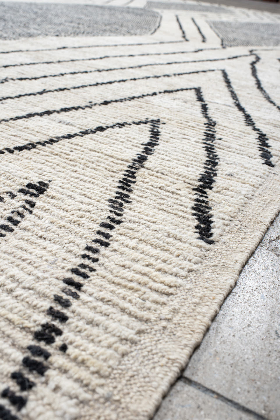 13' x 15' one-of-a-kind handmade vintage Tulu oversize rug. Color palette: ivory, charcoal, gray, black