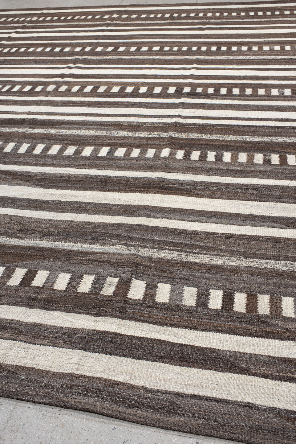 13' x 15' one-of-a-kind handmade vintage Kilim oversize rug. Color palette: black, brown, dark gray, gray, light gray, linen
