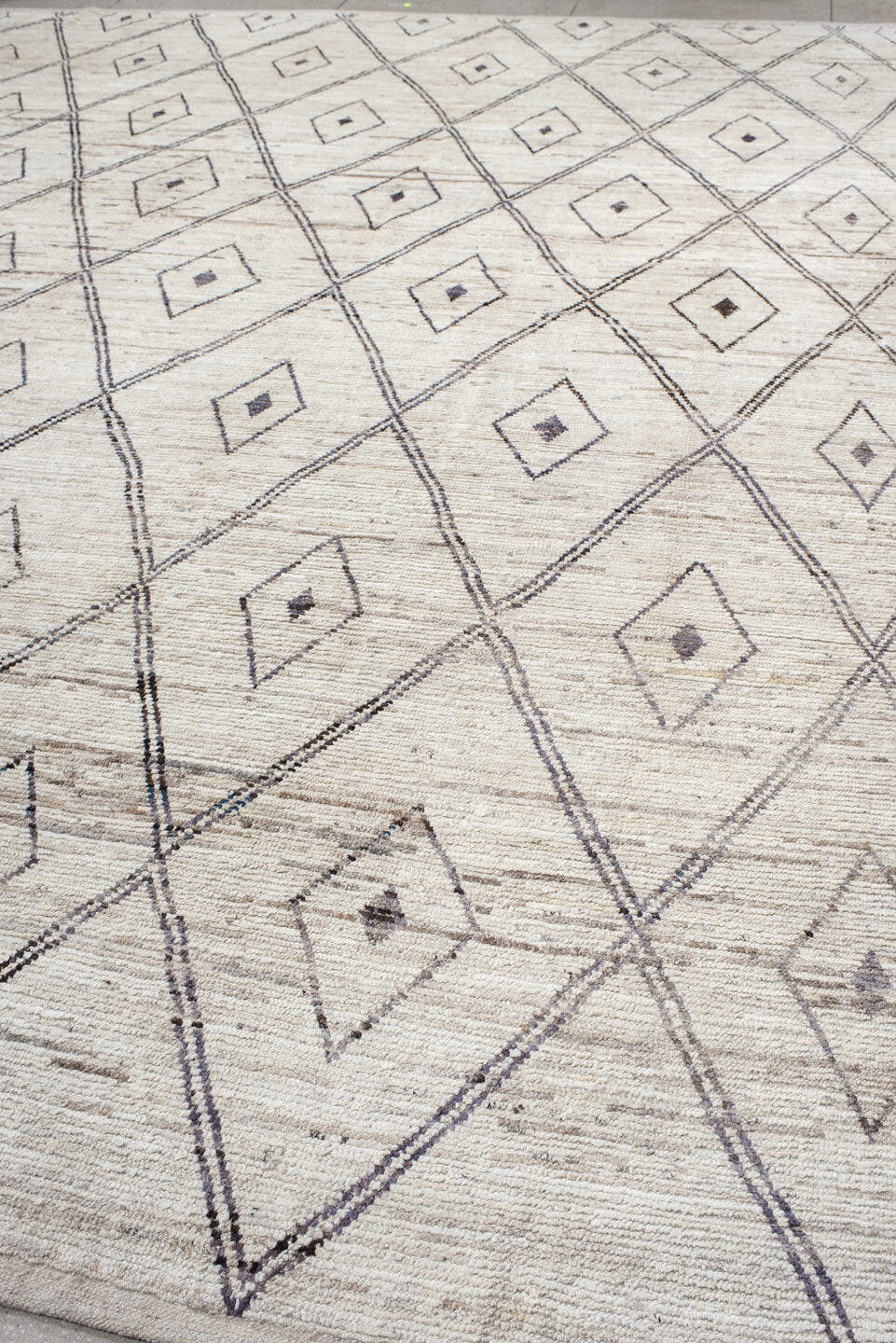 13' x 15' one-of-a-kind handmade vintage Tulu oversize rug. Color palette: ivory, taupe, charcoal, beige, gray, black