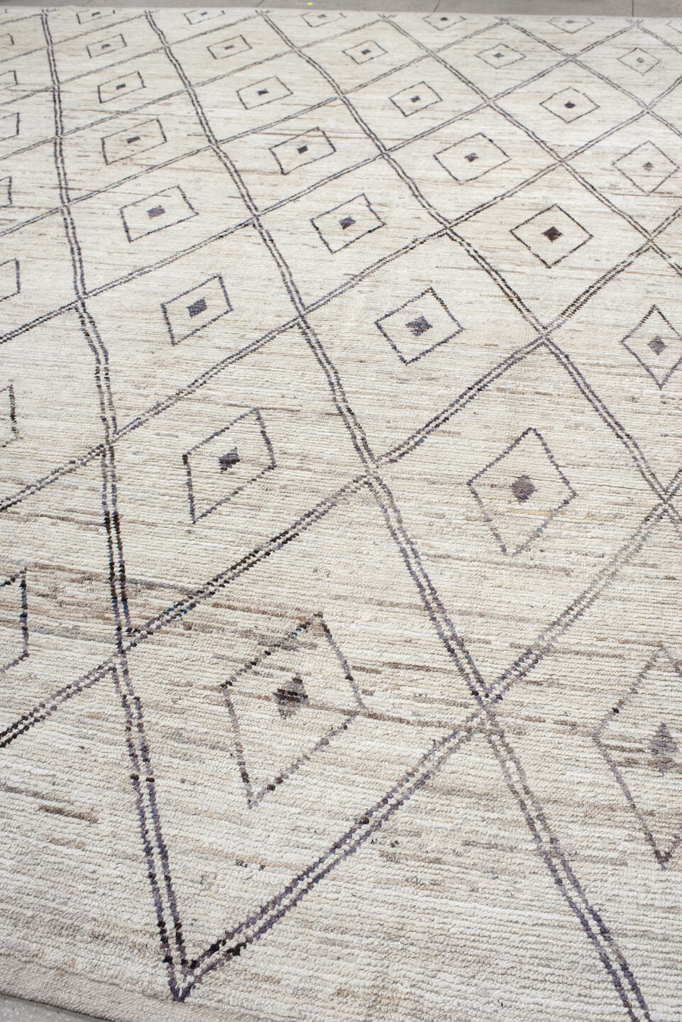 13' x 15' one-of-a-kind handmade vintage Tulu oversize rug. Color palette: ivory, taupe, charcoal, beige, gray, black