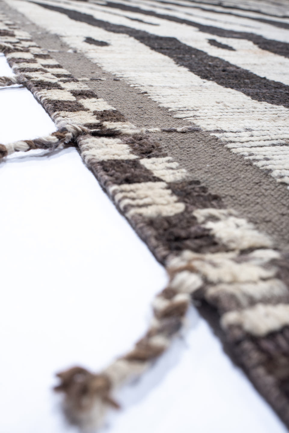 19' x 25' one-of-a-kind handmade vintage Tulu oversize rug. Color palette: ivory, charcoal, taupe, slate, gray, black, beige