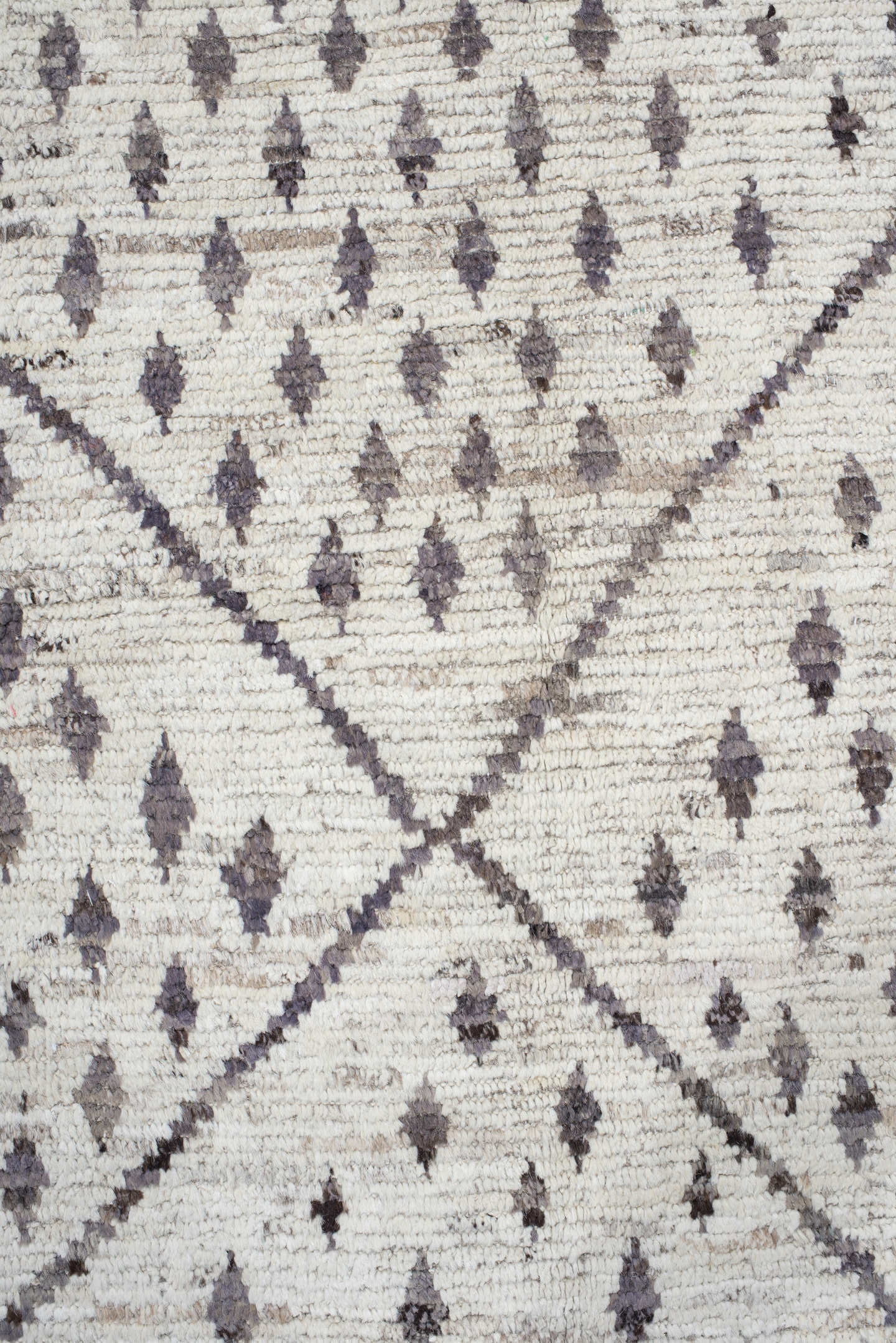 12' x 17' one-of-a-kind handmade vintage Tulu oversize rug. Color palette: ivory, charcoal, taupe, brown, gray, black, beige