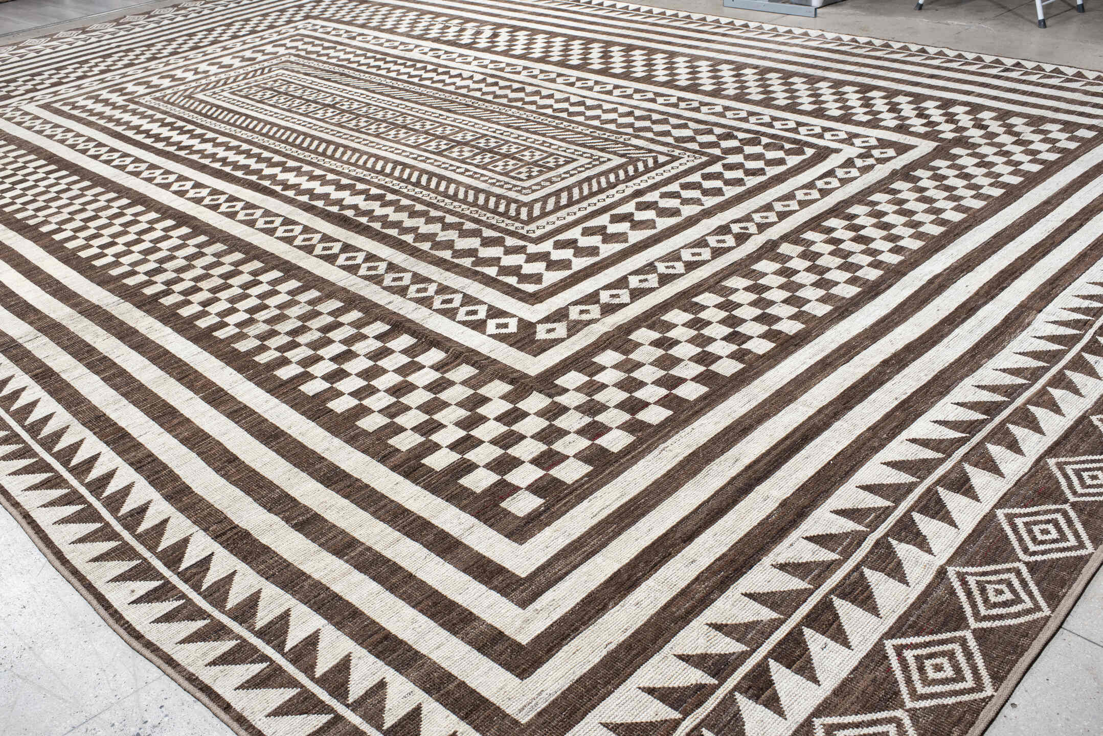 15' x 23' one-of-a-kind handmade vintage Tulu oversize rug. Color palette: ivory, brown, taupe, beige, gray