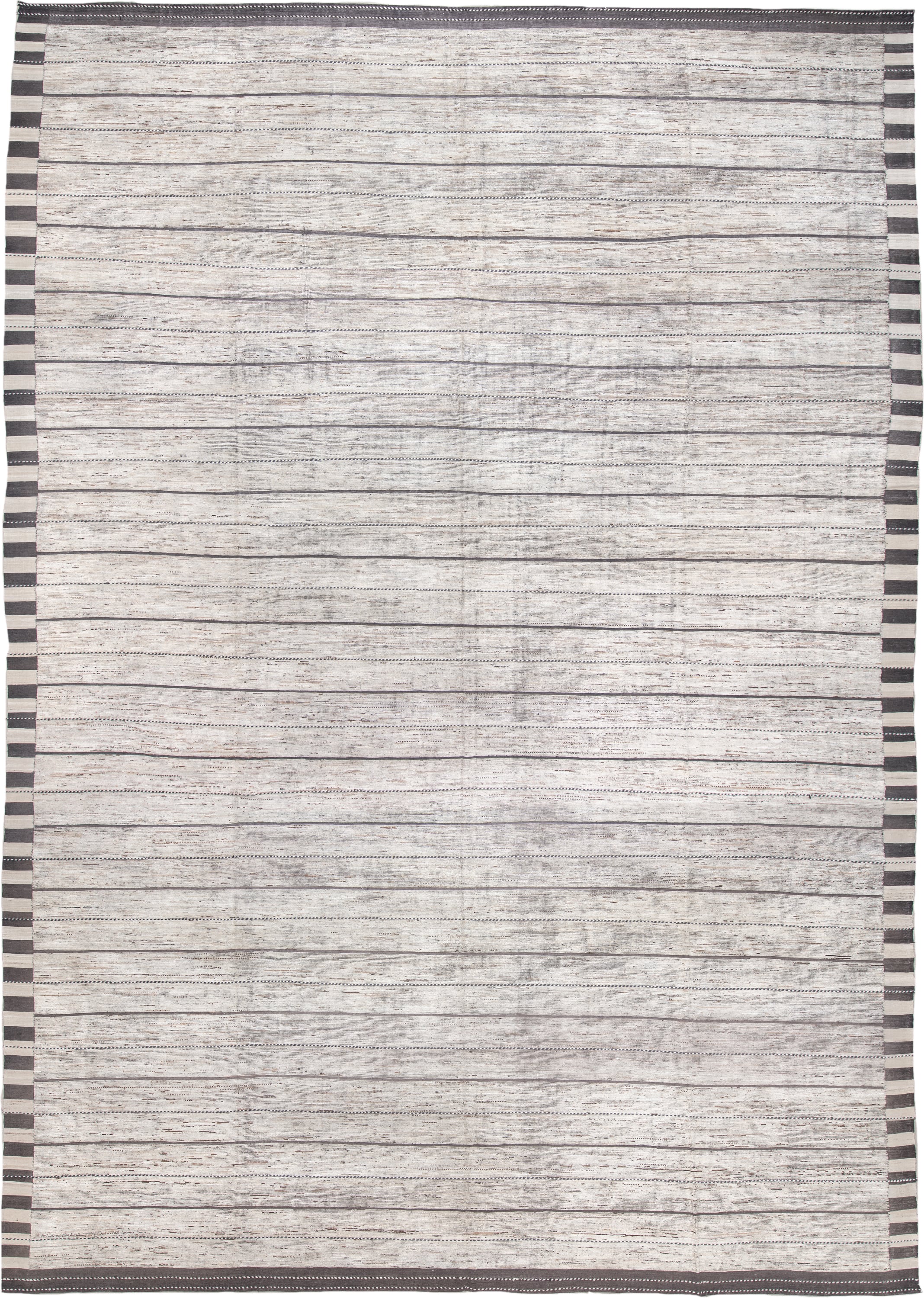 19' x 28' one-of-a-kind handmade vintage Tulu oversize rug. Color palette: ivory, charcoal, taupe, brown, gray, black, beige