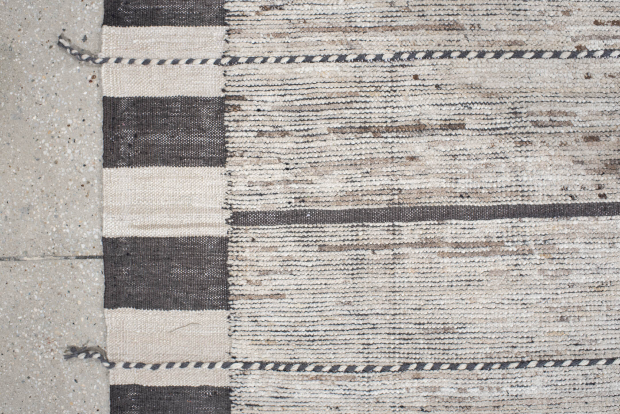 19' x 28' one-of-a-kind handmade vintage Tulu oversize rug. Color palette: ivory, charcoal, taupe, brown, gray, black, beige