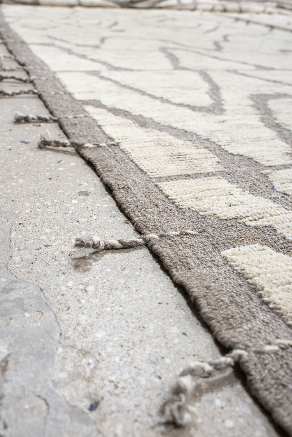 20' x 24' one-of-a-kind handmade vintage Tulu oversize rug. Color palette: ivory, gray, taupe, beige