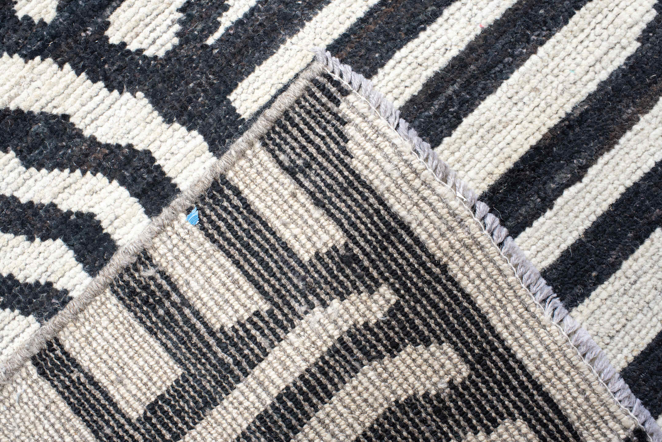 16' x 22' one-of-a-kind handmade vintage Tulu oversize rug. Color palette: ivory, charcoal, gray, black