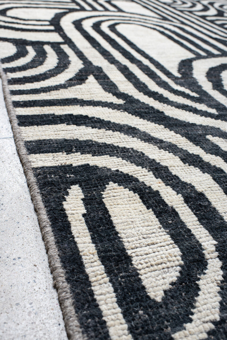 16' x 22' one-of-a-kind handmade vintage Tulu oversize rug. Color palette: ivory, charcoal, gray, black