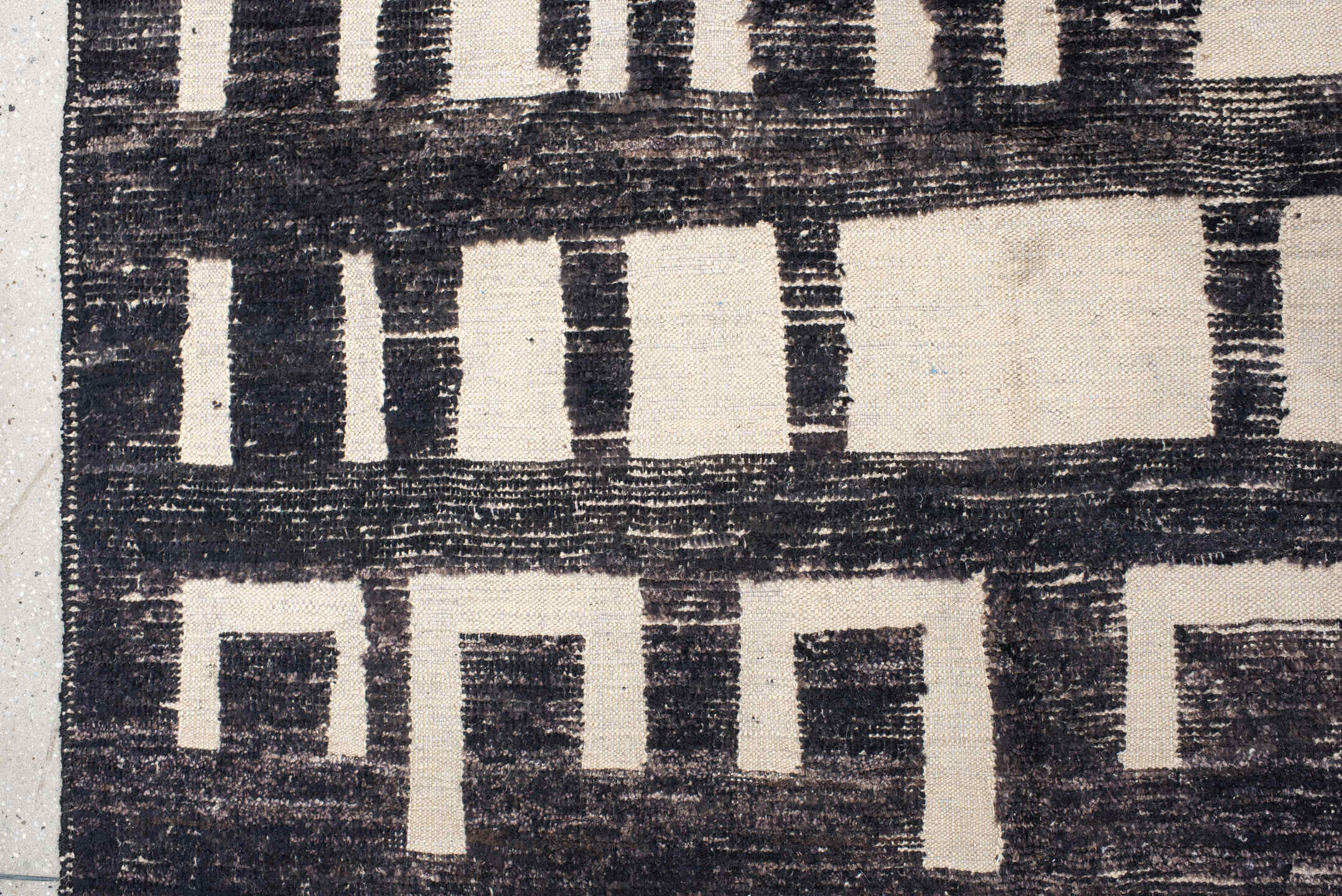 9' x 12' one-of-a-kind handmade vintage Tulu large size rug. Color palette: charcoal, ivory, gray, black