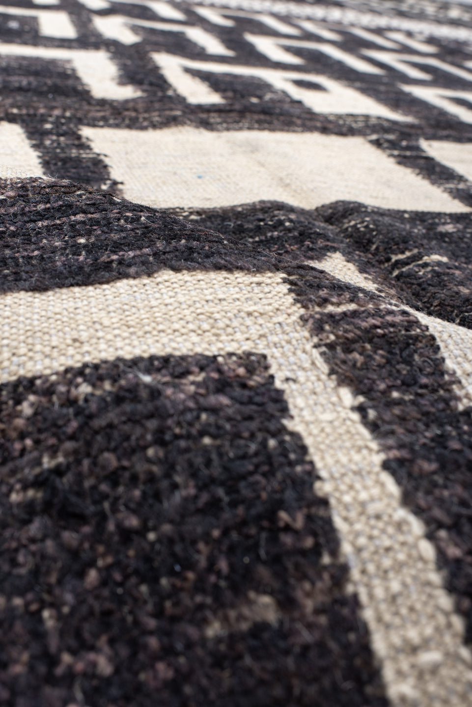 9' x 12' one-of-a-kind handmade vintage Tulu large size rug. Color palette: charcoal, ivory, gray, black