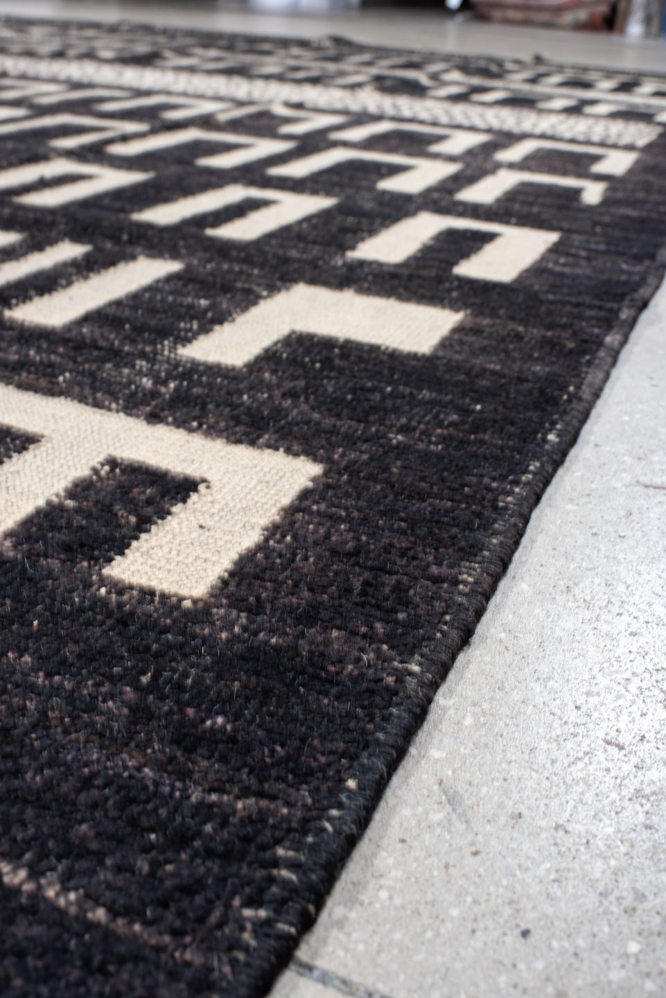 9' x 12' one-of-a-kind handmade vintage Tulu large size rug. Color palette: charcoal, ivory, gray, black