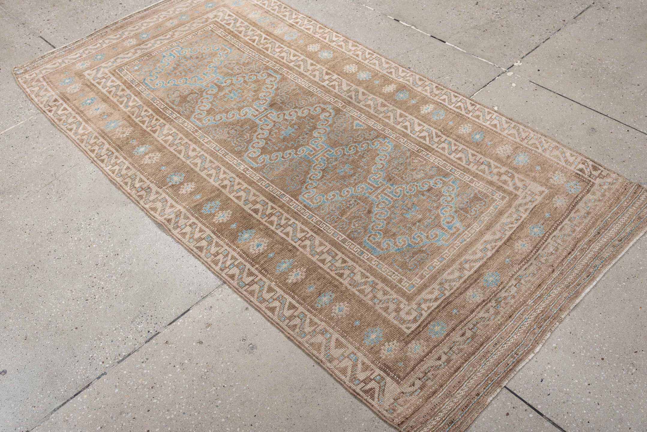 3' x 6' one-of-a-kind handmade antique Belouch runner rug. Color palette: camel, ivory, pale aqua, taupe, sand, beige, teal