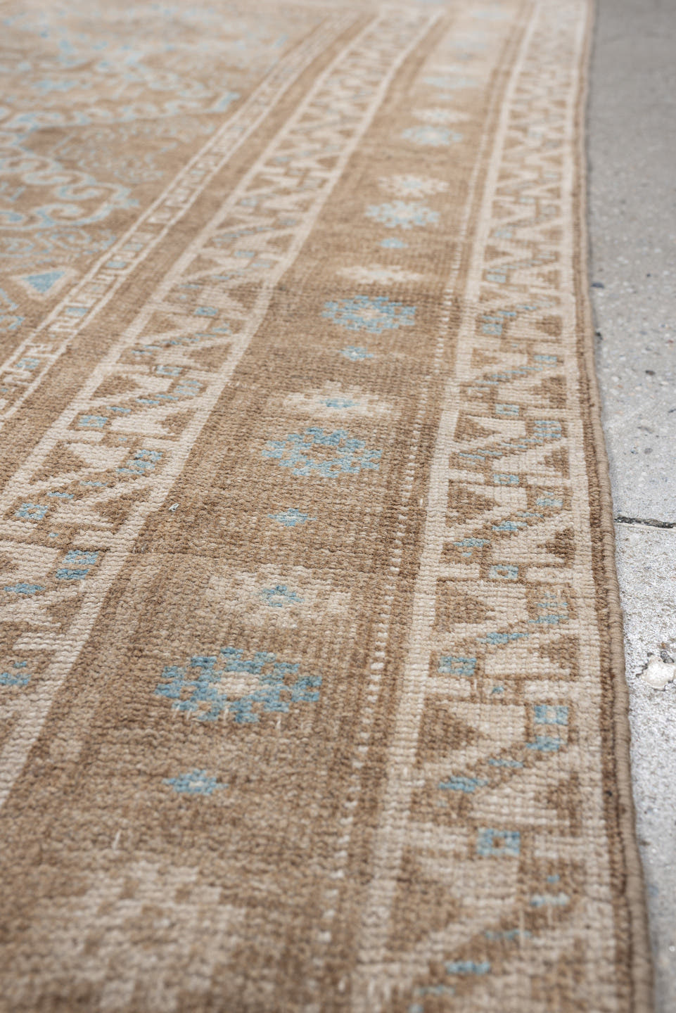 3' x 6' one-of-a-kind handmade antique Belouch runner rug. Color palette: camel, ivory, pale aqua, taupe, sand, beige, teal