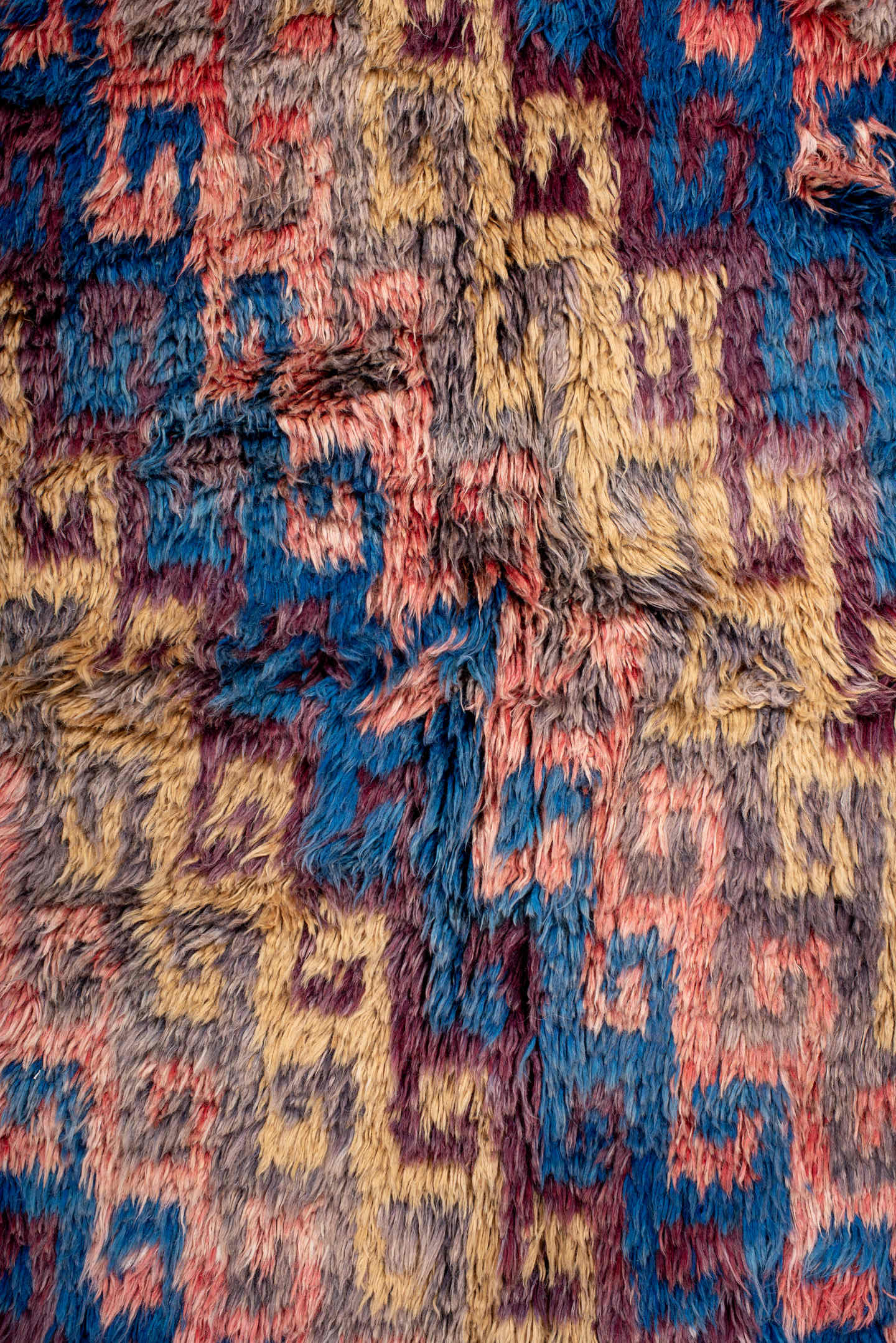 4' x 5' one-of-a-kind handmade vintage Moroccan small size rug. Color palette: taupe, blue, gold, plum, coral, gray, beige