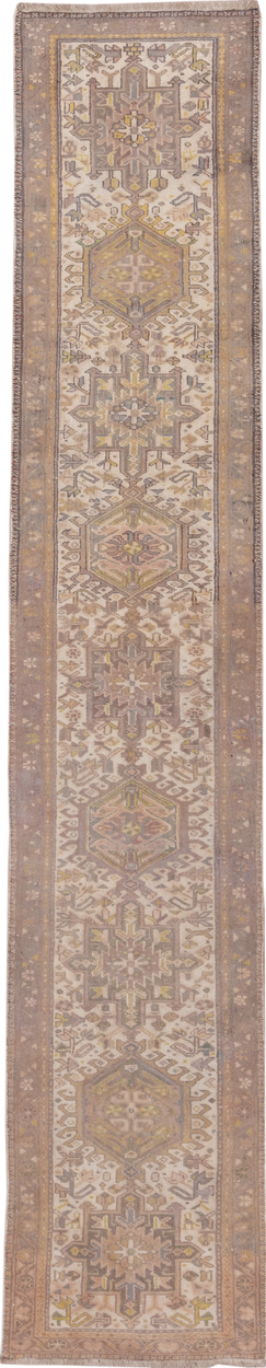 2' x 10' one-of-a-kind handmade vintage Karaje runner rug. Color palette: brown, gray, light gray, off-white, pink, snow