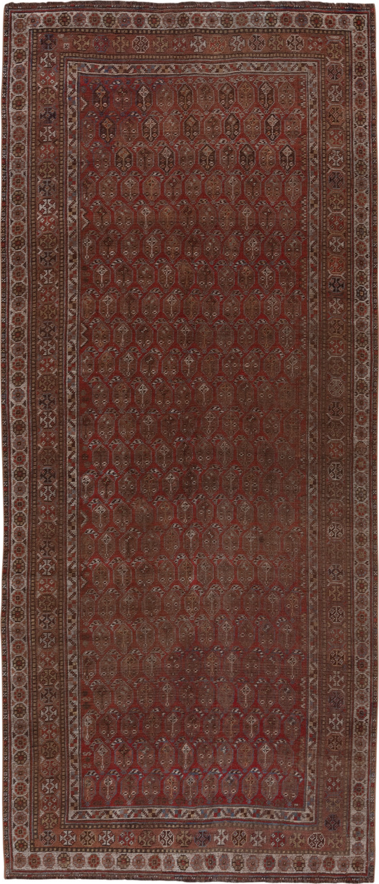 5' x 11' one-of-a-kind handmade vintage Shiraz runner rug. Color palette: brown, gray, light gray, pink, red, redwood
