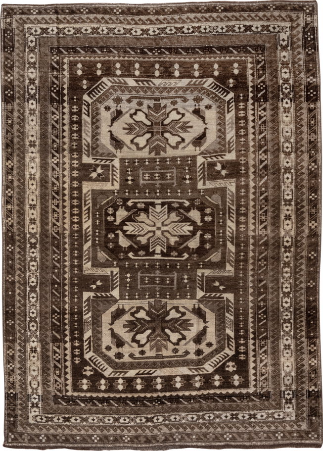5' x 7' one-of-a-kind handmade vintage Kars rug. Color palette: brown, gray, pink
