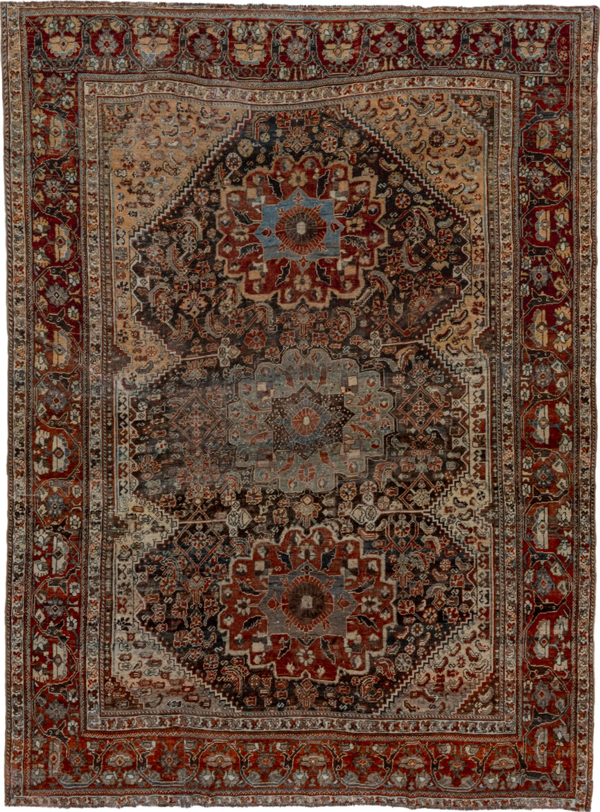 7' x 9' one-of-a-kind handmade vintage Shiraz rug. Color palette: brown, gray, red