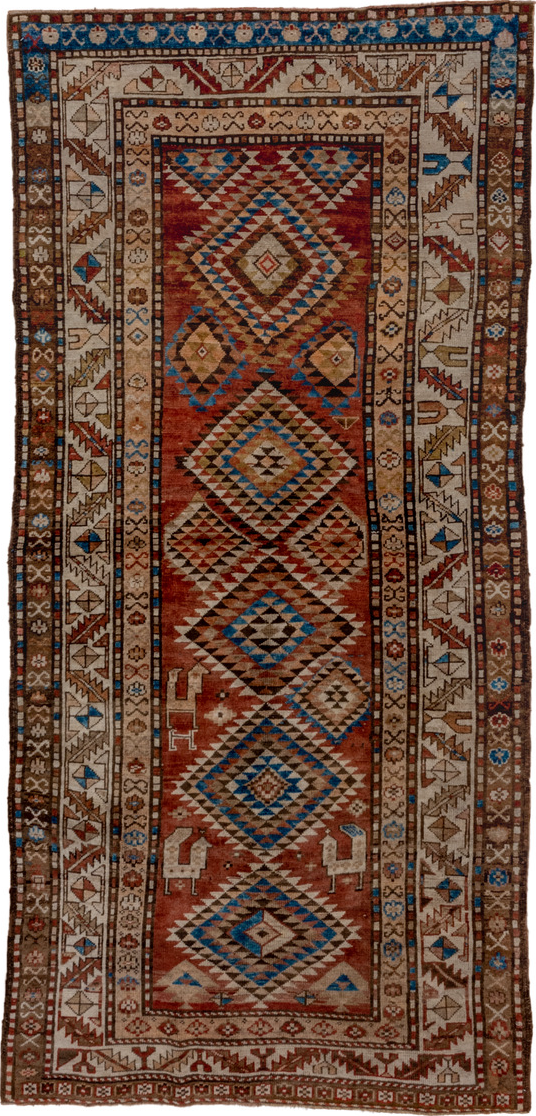 4' x 9' one-of-a-kind handmade vintage Kurd runner rug. Color palette: arapawa, blue, brown, gray, light gray, pink