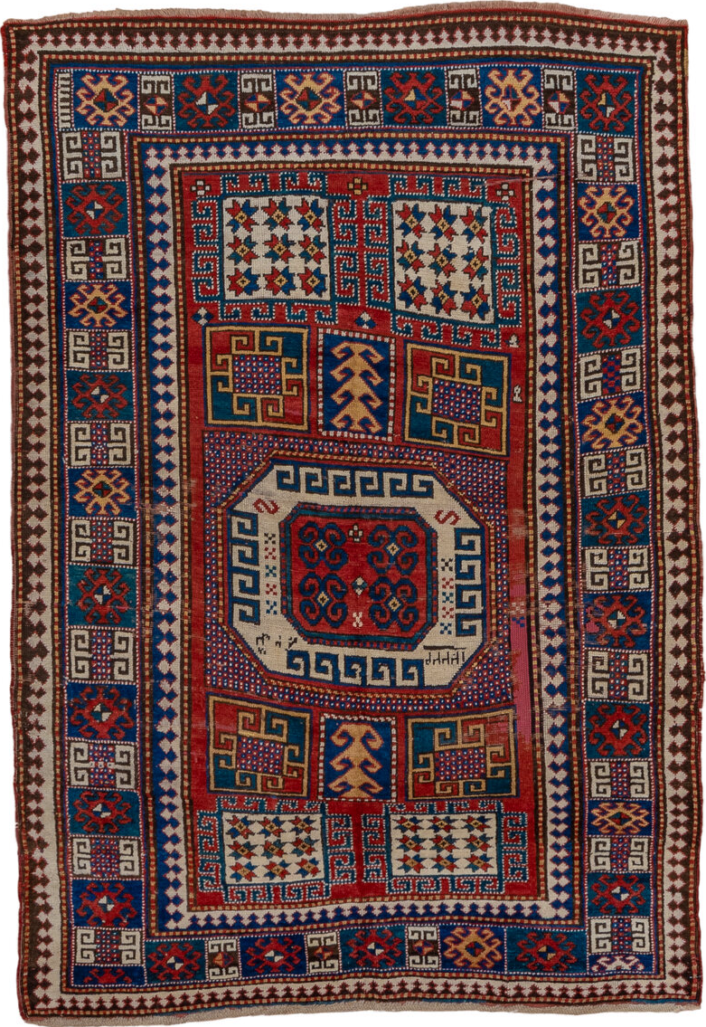 5' x 7' one-of-a-kind handmade vintage Kazak rug. Color palette: blue, brown, gray, pink, red