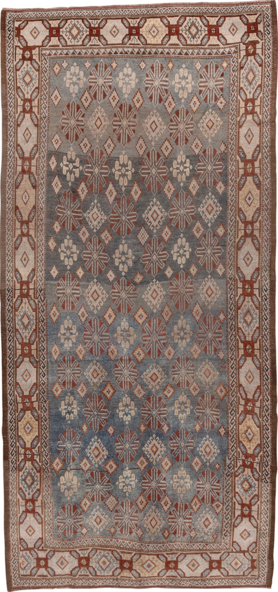 4' x 9' one-of-a-kind handmade vintage Caucasian runner rug. Color palette: brown, gray, pink
