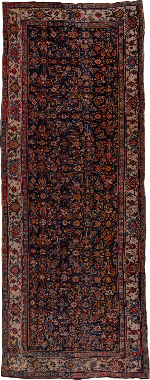 4' x 12' one-of-a-kind handmade vintage Bidjar runner rug. Color palette: black, blue, brown, gray, pink, red, redwood
