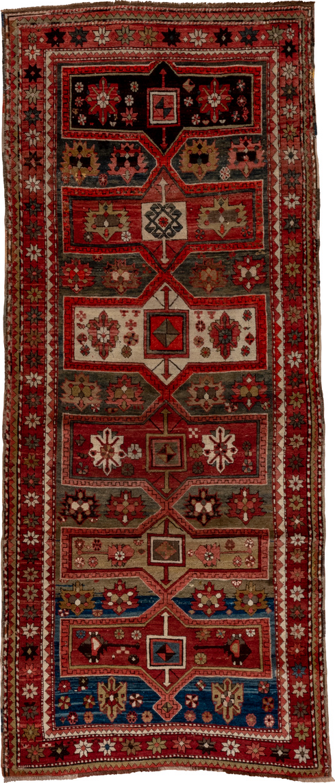 3' x 8' one-of-a-kind handmade vintage Kazak runner rug. Color palette: black, blue, brown, gray