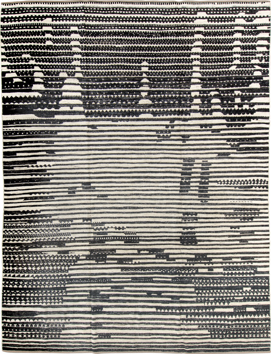 10' x 13' one-of-a-kind handmade vintage Tulu large size rug. Color palette: black, blue, brown, charcoal, dark gray