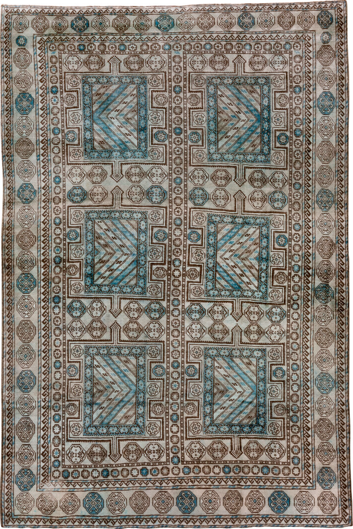 6' x 9' one-of-a-kind handmade vintage Turkish medium size rug. Color palette: black, blue, brown, gray, light gray