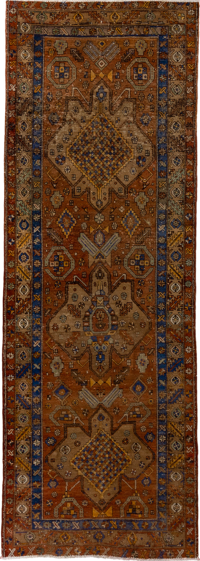 3' x 10' one-of-a-kind handmade vintage Heriz runner rug. Color palette: blue, brown, gray, pink, saddle brown