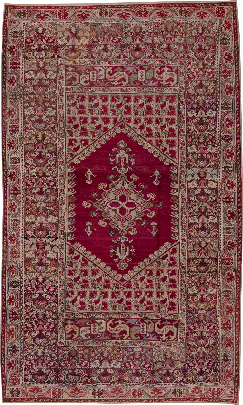 6' x 11' one-of-a-kind handmade vintage Ghordes large size rug. Color palette: brown, gray, off-white, pink, red, snow