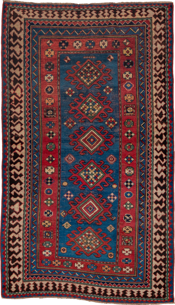 3' x 6' one-of-a-kind handmade vintage Kazak small size rug. Color palette: blue, brown, gray, pink, red
