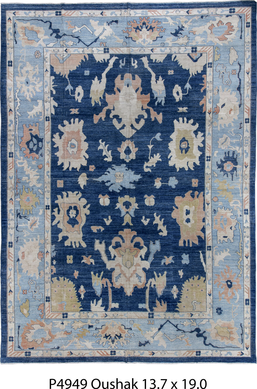 13' x 19' one-of-a-kind handmade vintage Oushak oversize rug. Color palette: blue, brown, gray, pink, red